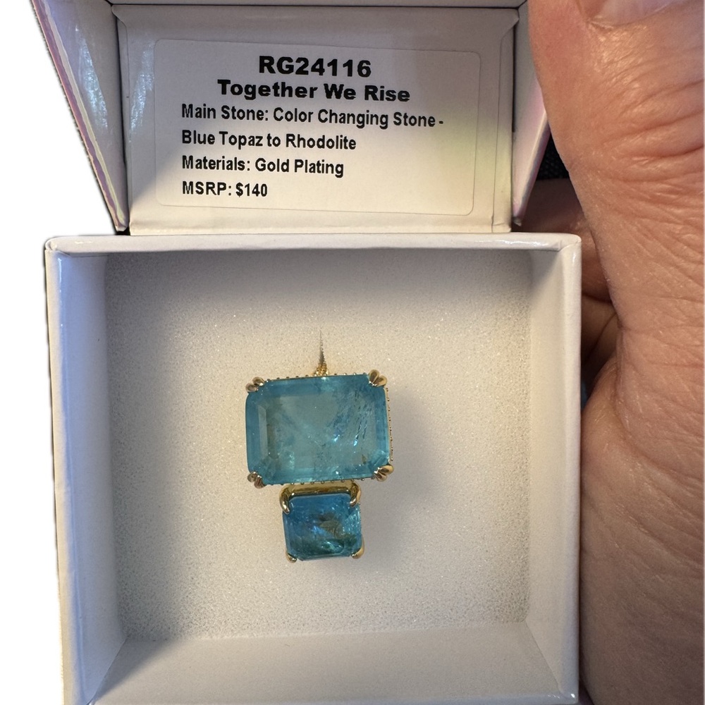Together We Rise Gold Plated Color Changing Blue Topaz Ring